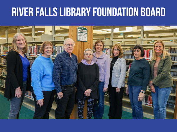 River Falls Library Foundation board members standing in the library