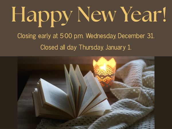 yellow writing brown background with an open book candle and blanket on a table